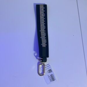 LuLuLemon keychain gold and dark green